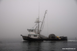 Fishing vessel in the fog.