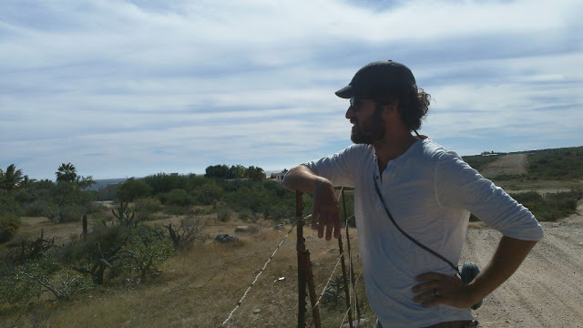 Taking a long walk on a dirt road in Frailes, on the way to the beach to get naked and play in the big surf. Note 1: My hat no longer fits over my hair. Note 2: Our bottoms were completely exfoliated that afternoon.