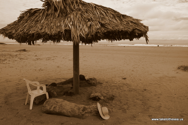 The abandoned little palapa that provided refuge in the hot Mexican sun. Over time someone donated a three legged plastic chair, which we enjoyed thoroughly.