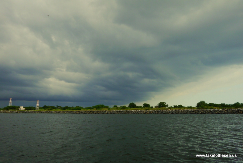 Las Escaleras  - the jettties at the entrance to Puerto Chiapas and a storm front.